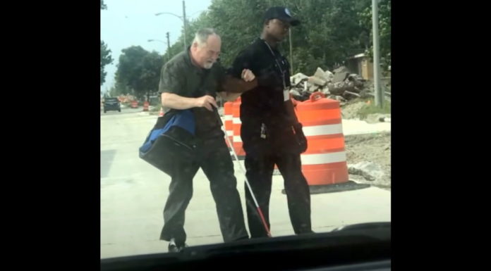 Bus driver caught on camera helping elderly blind man navigate his route