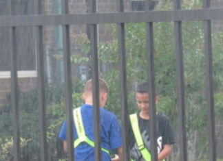 Teacher Catches Boys In A Patriotic Act In The Pouring Rain
