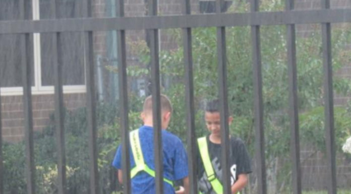 Teacher Catches Boys In A Patriotic Act In The Pouring Rain
