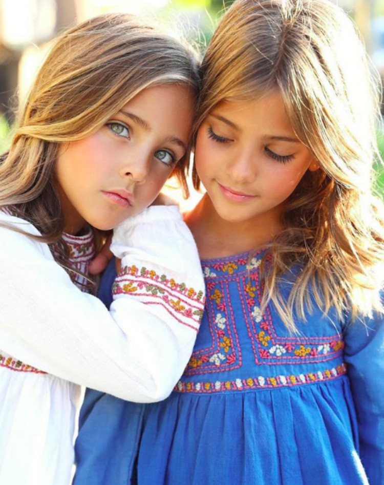 Dubbed �the most beautiful twins in the world� this is what  photo