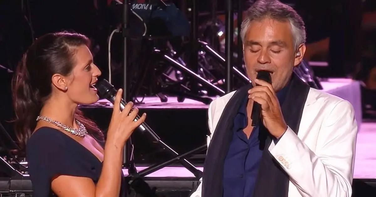 Andrea Bocelli and his stunning wife share the stage for a romantic duet