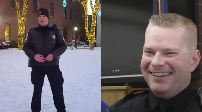 Police officer starts singing “O Holy Night” while citizens cheer