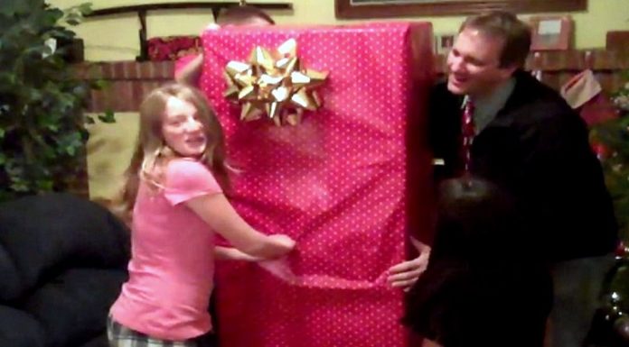 Family gives their newly adopted daughter the best Christmas surprise