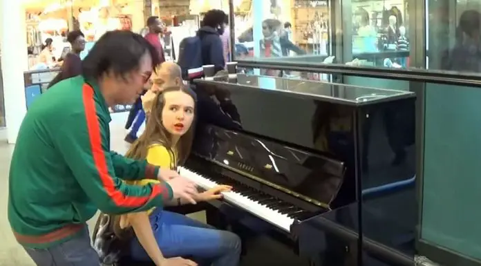 Girl rocks the public piano with unexpected companions