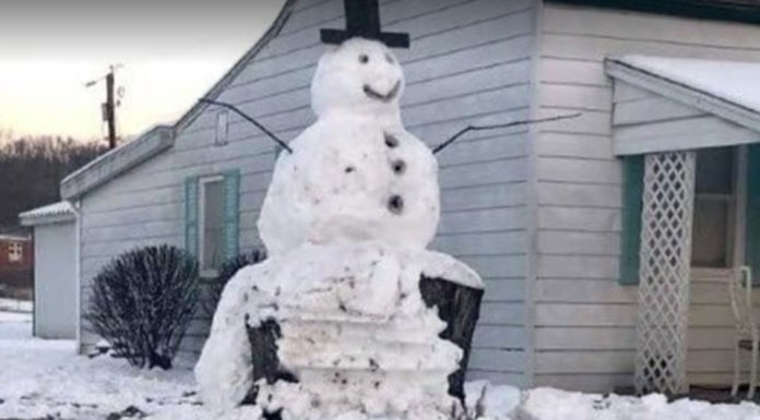 Punk driver slams snowman with truck, Poetic justice when he learns it’s built on huge stump