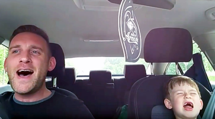 Father and son are driving in the car when the Sinatra music drops.