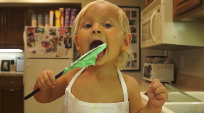 Tiny 2-yr-old bakes a cake in cute cooking show