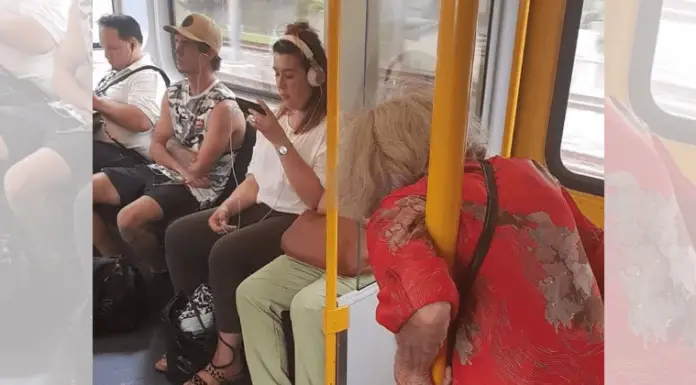 Photo of elderly woman forced to stand while youngsters remain seated busy on phones sparks outrage