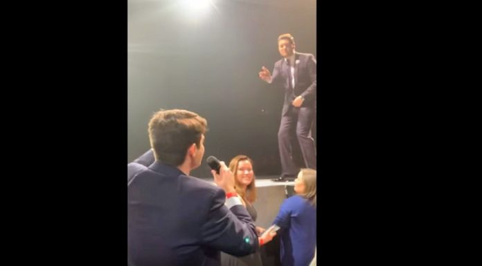Fan impresses Michael Buble when asked to sing at concert
