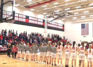 High school in Iowa opens up game with heartfelt rendition of national anthem
