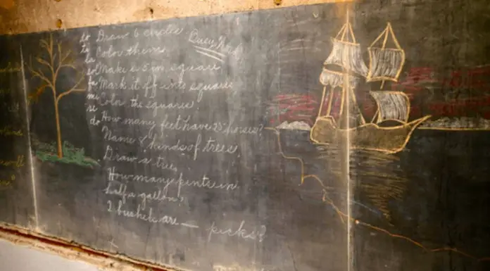 School stumbles upon chalkboards from 1917 during renovation, perfectly preserved lessons provide rare look into past.