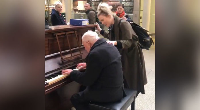 Old man playing piano gets unlikely singing partner in train station