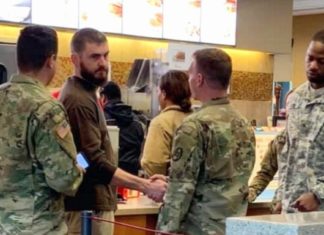 Dad surrounded by a group of soldiers at Chik-Fil-A jumps into action with desperate plea