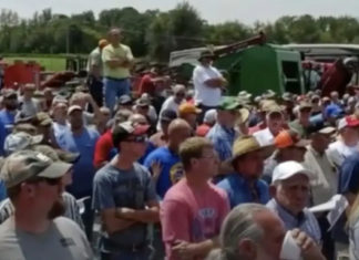 200 farmers stay quiet during auction so young man can get his long-lost family farm back