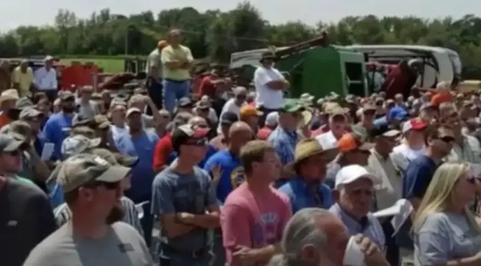 200 farmers stay quiet during auction so young man can get his long-lost family farm back