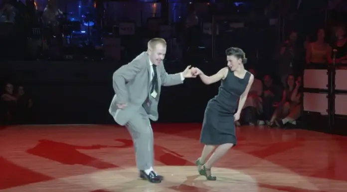Modern swing dance duo shows off vintage style as they tear up the floor to “Hey Baby!”