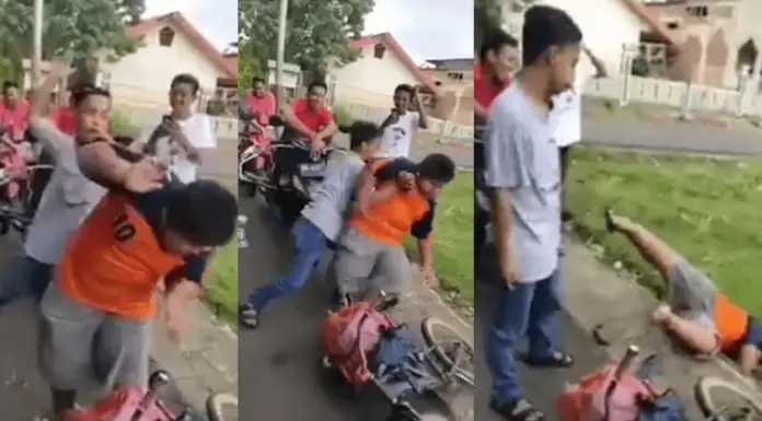 Boy selling food to earn a living is ambushed by bullies who slap and throw him to the ground while recording it