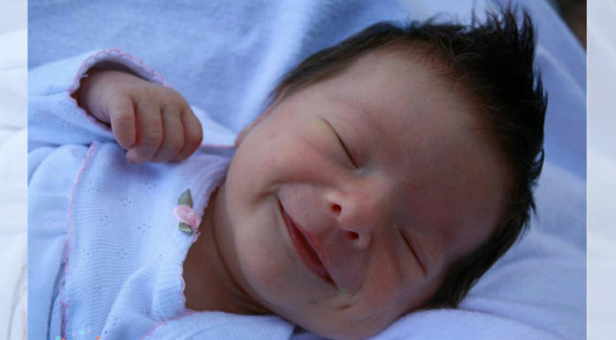 Newborn baby girl can’t stop smiling – mom sees it as a warning sign