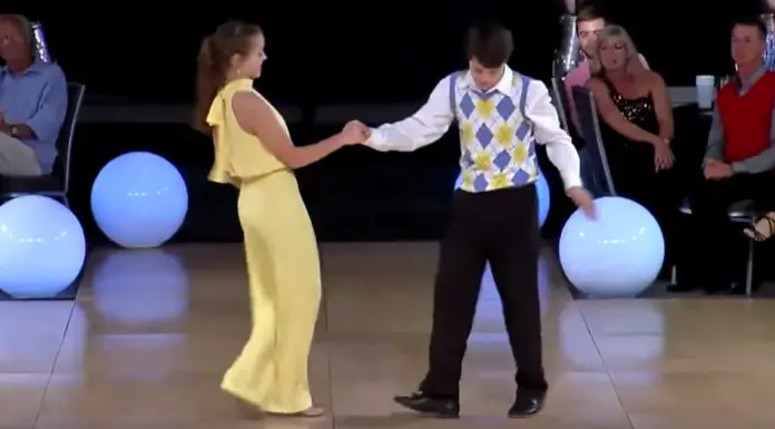 Junior shag dancers win the first place with fancy footwork and dizzying spins