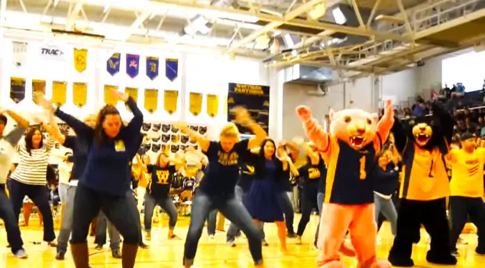 Principal’s speech is “interrupted” when teachers storm the stage to “Uptown Funk”
