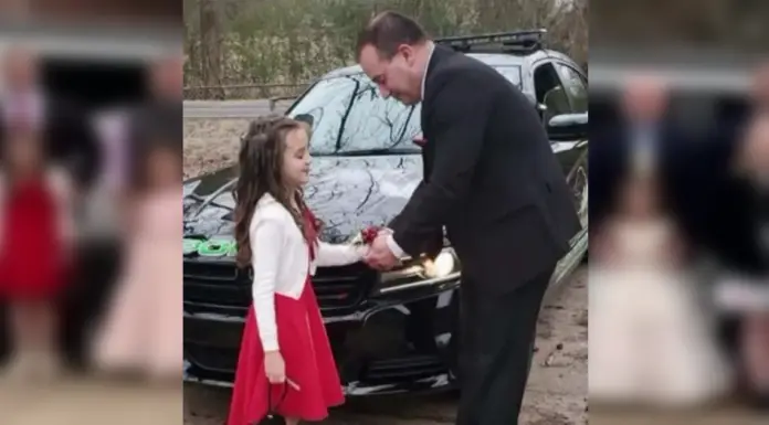 Cop takes 8-year-old girl whose dad passed away to a father-daughter school dance