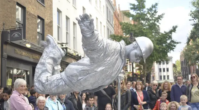 If you ever wondered how the silver man floats, this is your chance to see his trick revealed