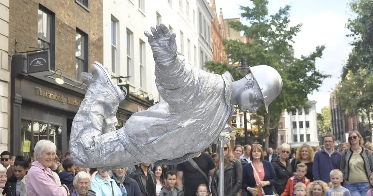 If you ever wondered how the silver man floats, this is your chance to see his trick revealed