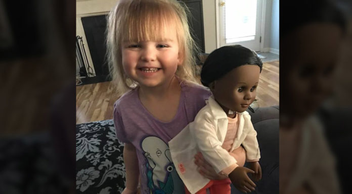 Two year old has the perfect response for cashier who questioned black doll