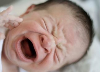 2-day-old baby girl found wrapped in a plastic back with a knife sticking out of her back