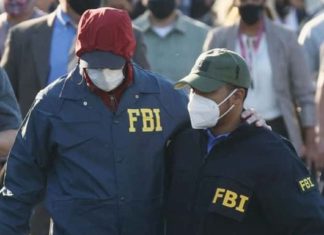 Two FBI agents killed and three injured while serving a search warrant in child-pornography investigation