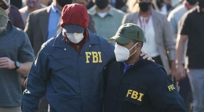 Two FBI agents killed and three injured while serving a search warrant in child-pornography investigation