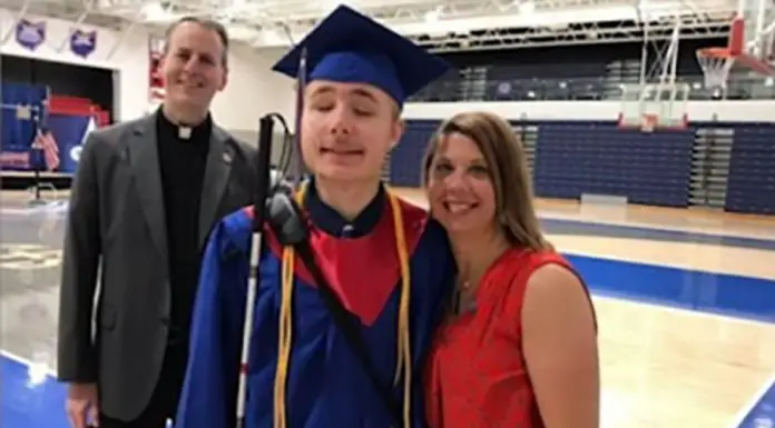 Legally blind student graduates with top marks and receives a college scholarship