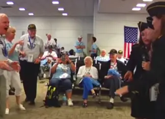 Veterans waiting at airport start dancing to “Boogie Woogie Bugle Boy”
