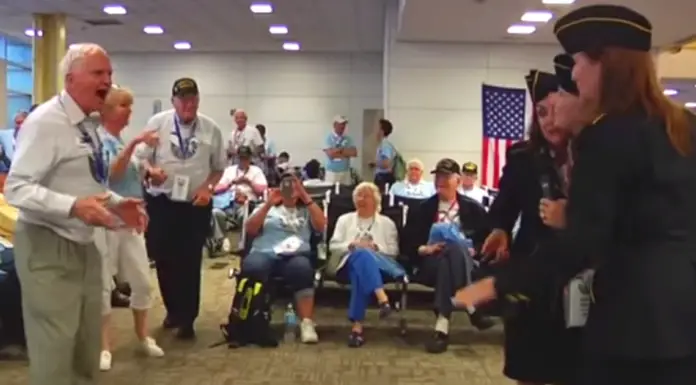 Veterans waiting at airport start dancing to “Boogie Woogie Bugle Boy”