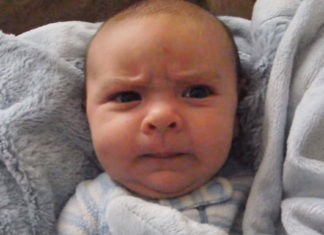 Baby puts on every facial expression there is while waking up