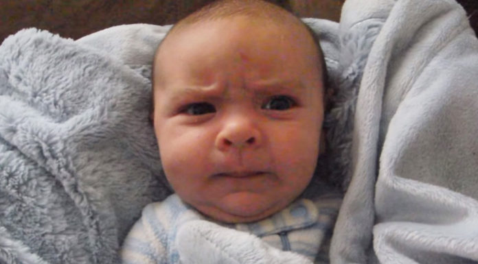 Baby puts on every facial expression there is while waking up