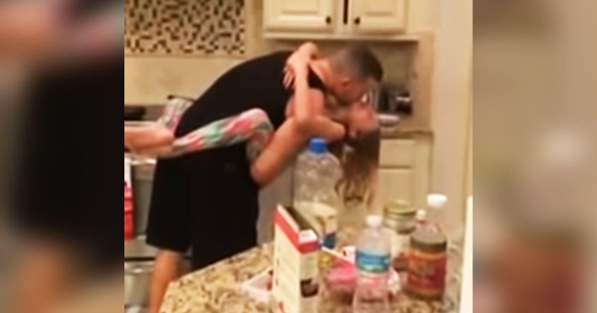 Dad and daughter make breakfast while dancing together not k