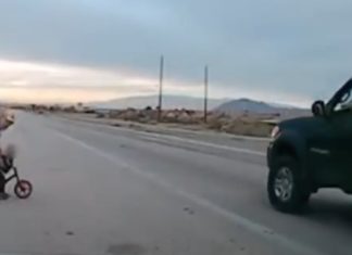 Couple driving on Boulder Highway in Las Vegas spot a toddler biking right into oncoming traffic