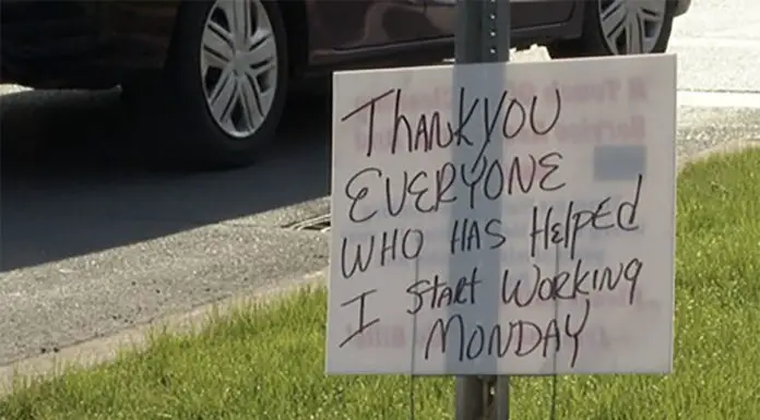 Man who spent months at a corner asking passersby for help thanks them with a sign