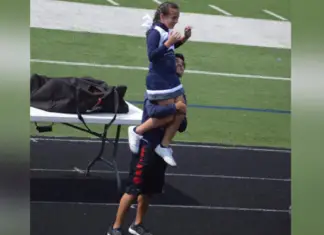 High school senior steps in for a cheerleader whose dad can’t make it to Parent’s Day