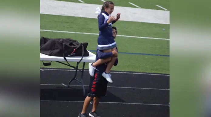 High school senior steps in for a cheerleader whose dad can’t make it to Parent’s Day