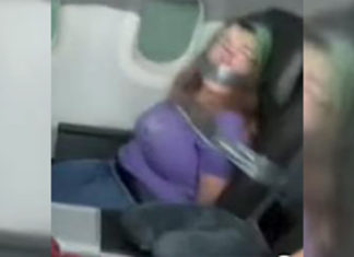 Woman duct-taped to seat after trying to open plane door mid-flight