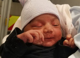 Newborn baby boy found alive in a dresser drawer in Chicago alley