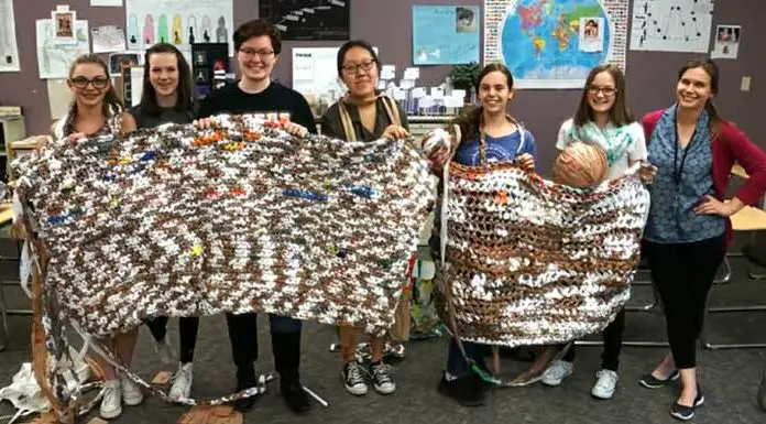 Students make blankets out of plastic bags for the homeless