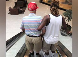 Young man steps in for an elderly gentleman who’s afraid to use the escalator at the mall