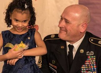 National guard soldier escorts kindergartner to her father-daughter dance