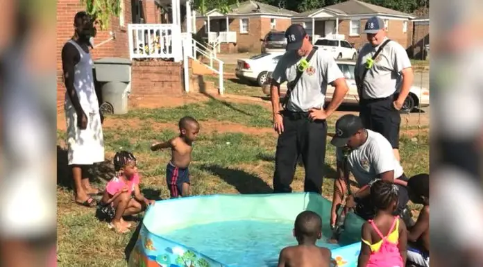 Firefighters lend a helping hand when noticing mom filling her kids’ pool with a pot