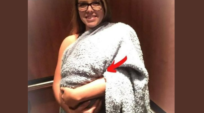 A woman enters the hospital with a blanket-covered bundle, assumed to be a child- When she reveals it, the staff falls silent