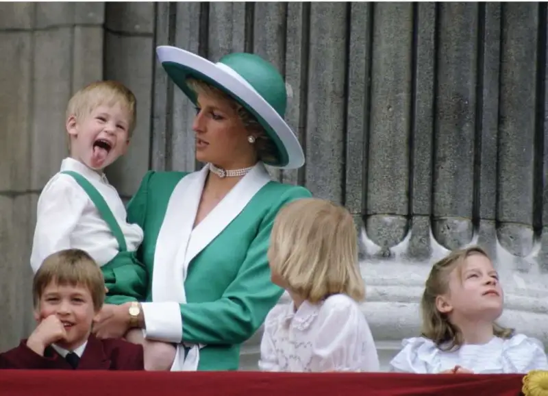 Princess Diana holding son