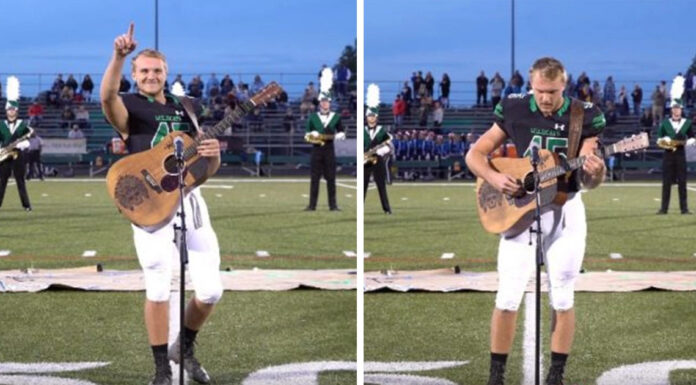 High schooler takes off his helmet and grabs a guitar to sing national anthem